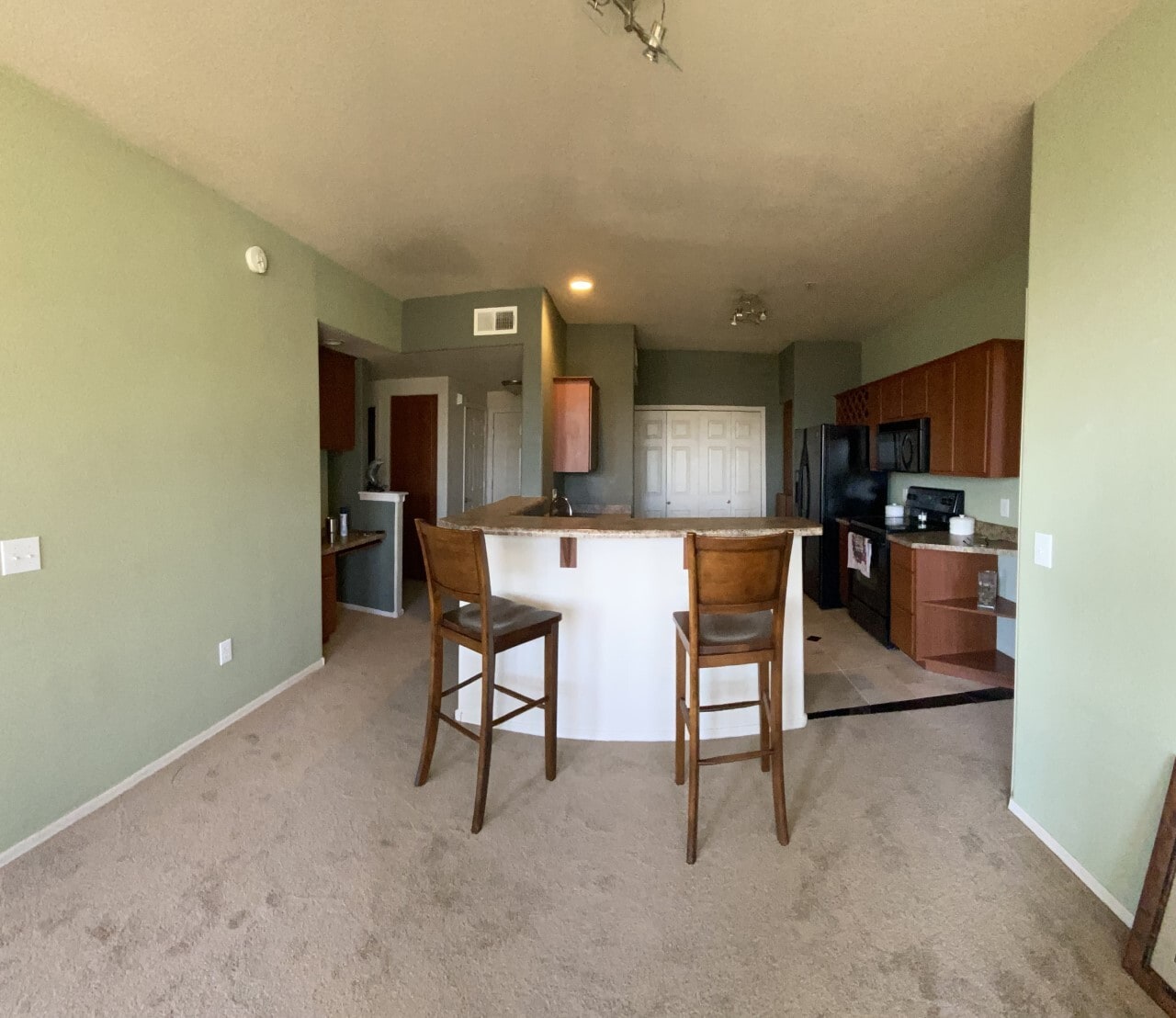 living room/kitchen - 9820 N Central Ave