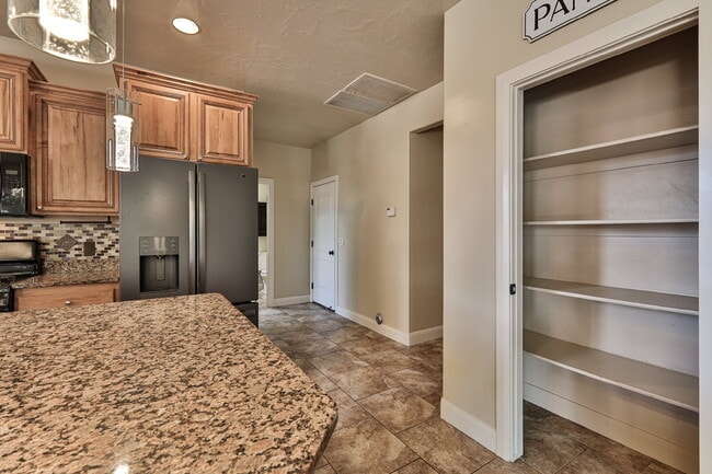 Building Photo - "Spacious 4-Bedroom Retreat with 3,584 Sq ...