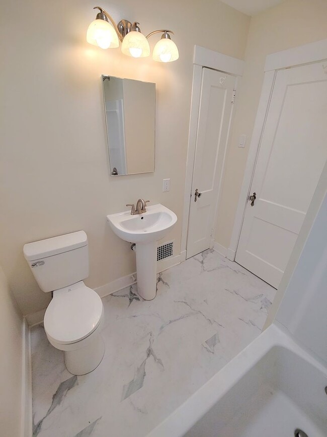 Building Photo - *Spacious & Updated 3BD/1BA Single-Family Home Available in Brookline*