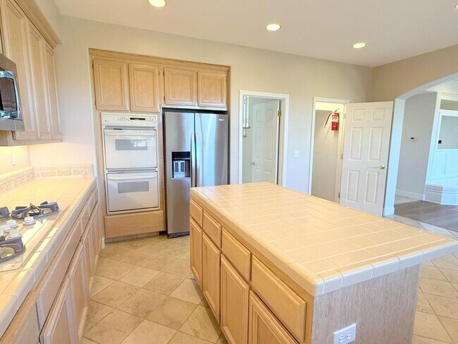 Building Photo - Former Model Home in Desirable Bridges Com...
