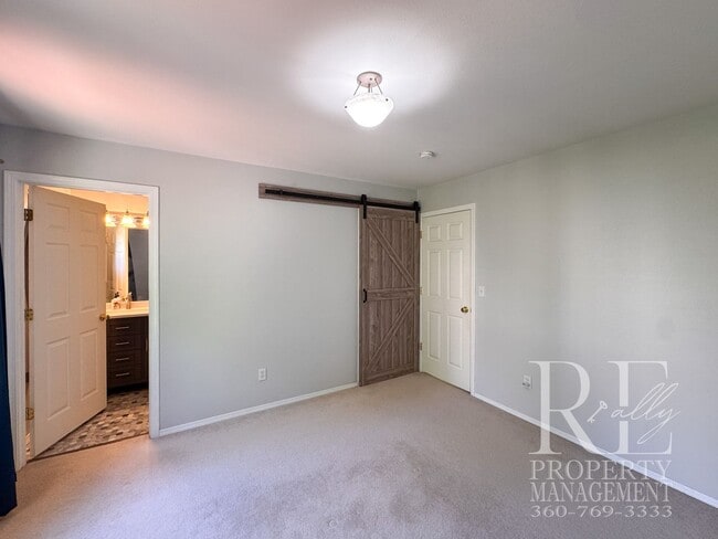 Building Photo - Dual Primary Suites, Huge Backyard Deck & Sun-Filled Living Spaces Near Everyday Conveniences
