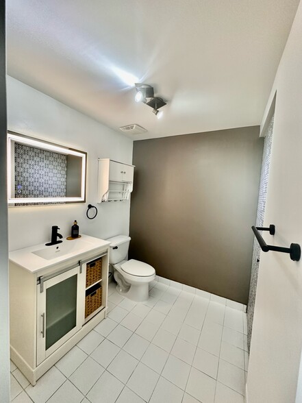 Downstairs Bathroom with Washer and Dryer - 690 SW 1st Ct