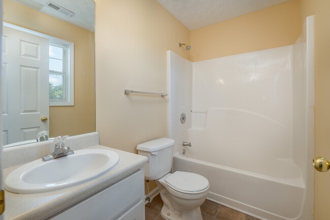 Building Photo - Coing Soon 2/25/26) Impressive 4 Bed, 3 Bath with Home Office!