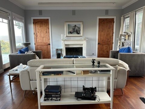 Theater/family room: 180-inch movie theater with laser projector and Dolby surround sound. - 115 Inez Pl