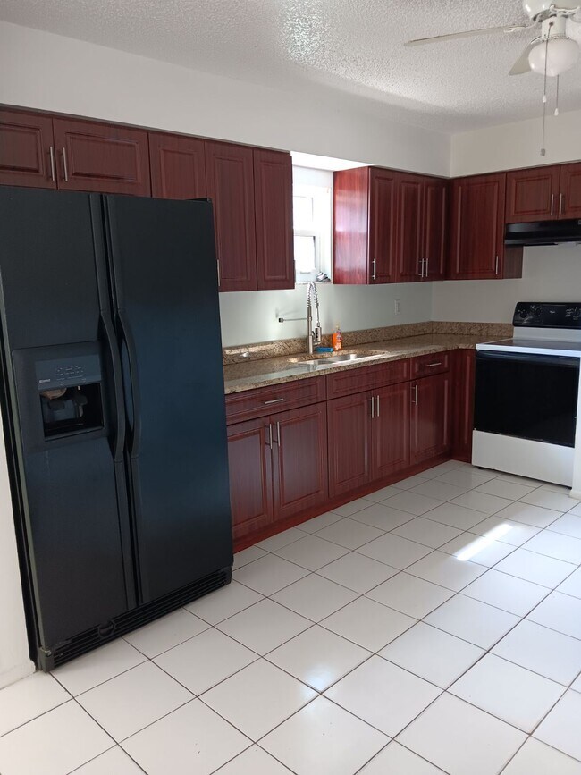 The fridge has been updated with a newer one, as ssen in the picture below - 5849 Crestmont St