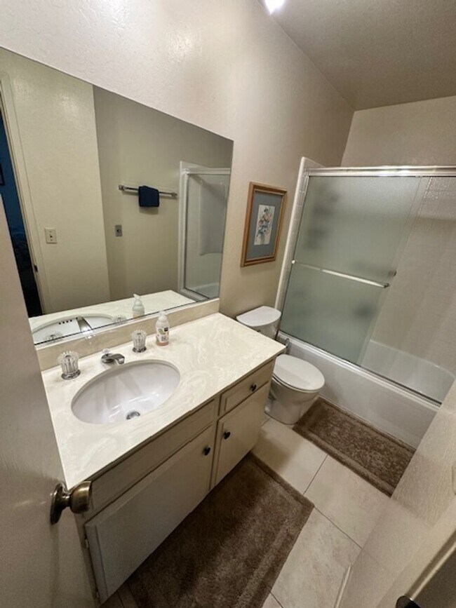 Building Photo - Condo with beautiful channel views and boat slip available for a Winter or Summer seasonal 3-6 mo...