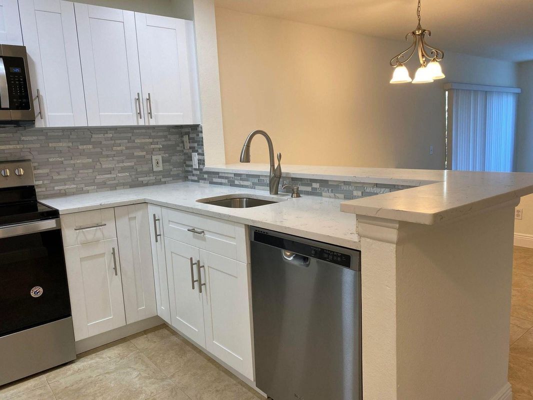 Building Photo - 1885 Palm Cove Blvd