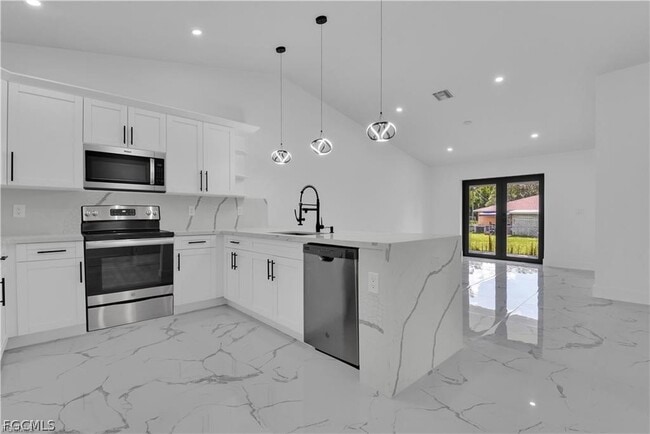 Building Photo - 4921 Leonard Blvd S