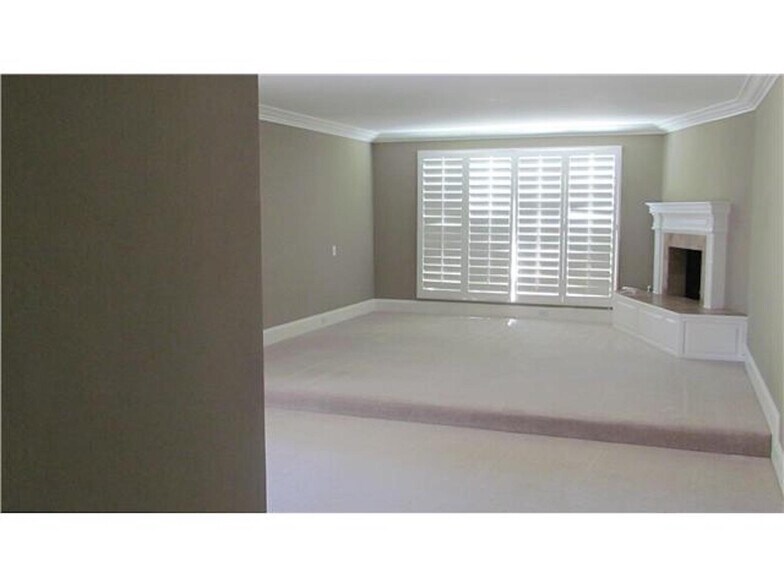 master bedroom with fireplace - 2015 Hidden Crest Dr