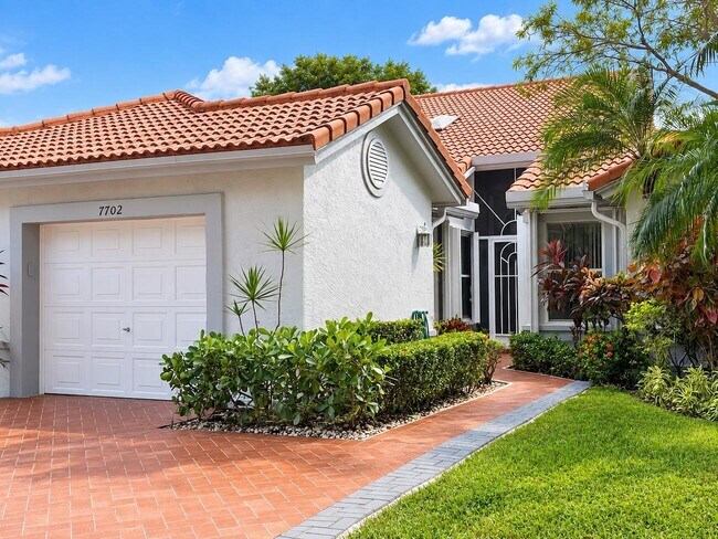 Building Photo - 7702 Majestic Palm Dr