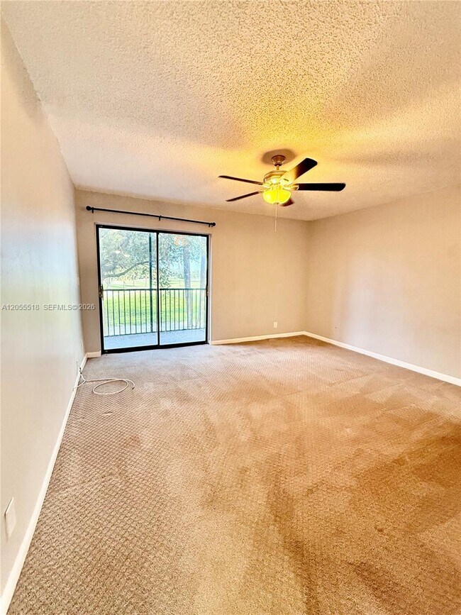 Building Photo - 200 Jacaranda Country Club Dr