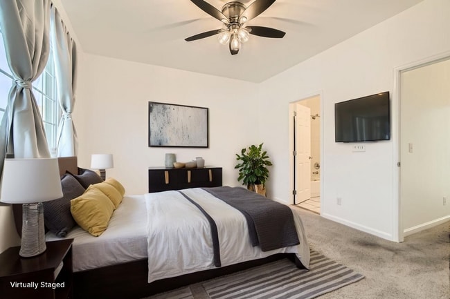 Building Photo - Modern 2-Bed Townhouse with Private En-Suites, Parking for 3 Cars  & Community Amenities