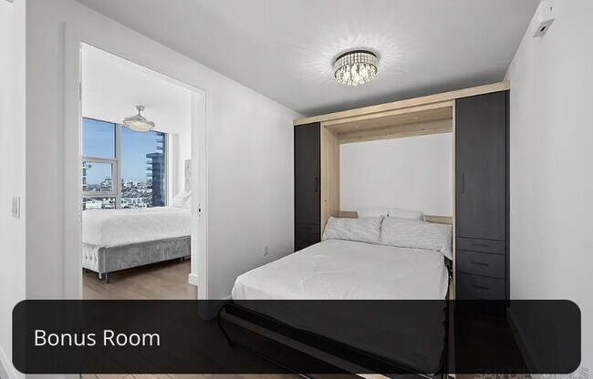 Building Photo - Panoramic Bayfront Luxury Living in the Heart of Little Italy