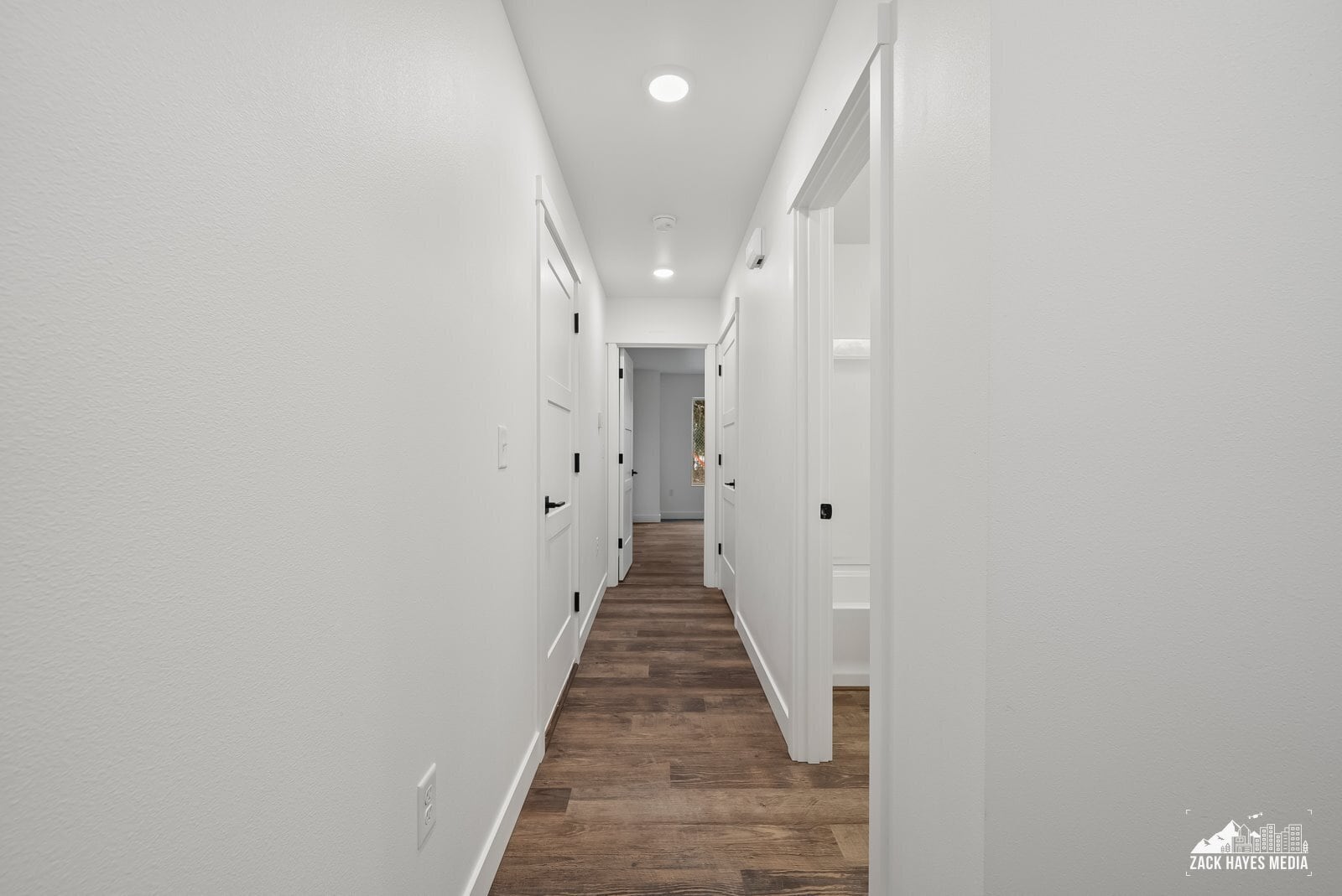 Downstairs hall to BR/office & garage - 1493 W 40th Ave