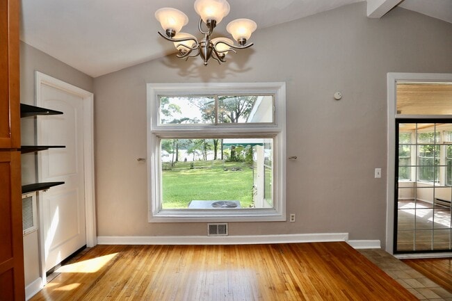 Building Photo - Available 06-22-26! Updated Waterfront Home! Extras Like Workshop & Sunroom, Pet Friendly, Hardwo...