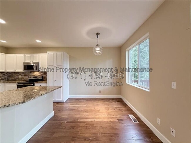 Building Photo - 5758 NE Damsel Dr