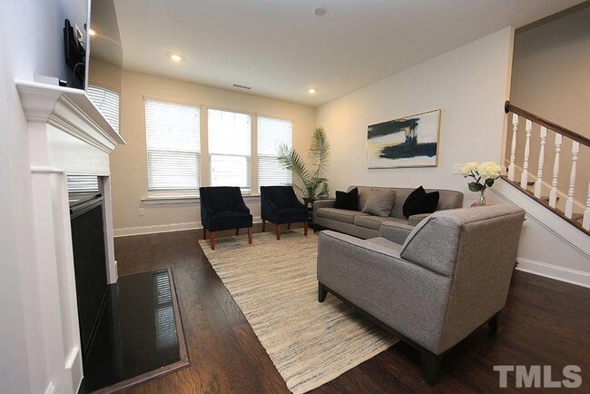 Building Photo - Main Floor Owner's Suite PLUS Main Floor G...