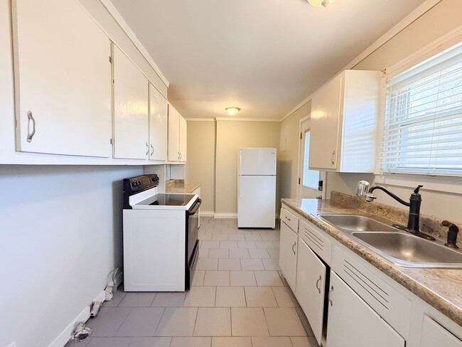 Building Photo - 3-Bedroom Single-Family Home Near TTU with Hardwood Floors and Carport