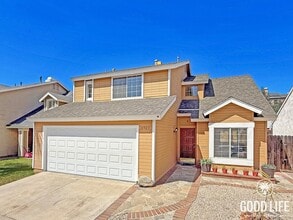 Building Photo - Stylish 4B/2.5BA Home in Moreno Valley with Attached Garage and Upgraded Interiors