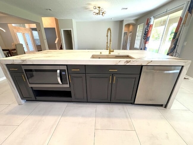 Building Photo - Available NOW!  Stunning 5-Bedroom Home in...