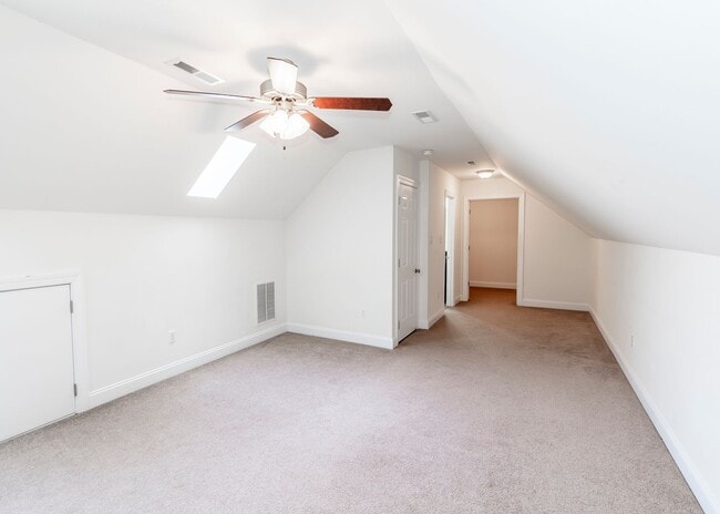 Building Photo - Huge house with vaulted ceilings and fenced in rear yard