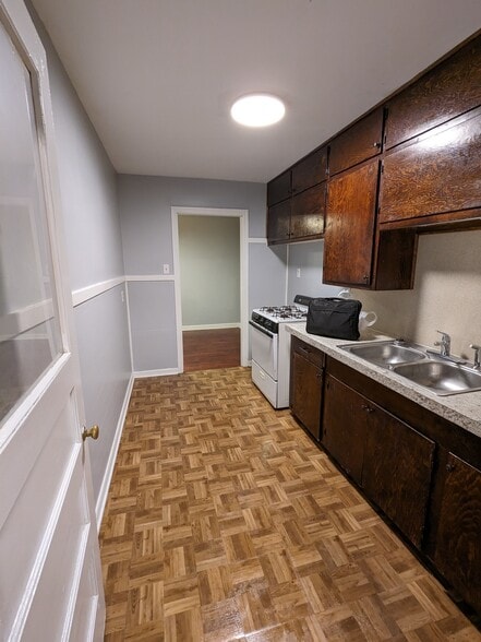 Kitchen with view into dining room - 1114 N 35th St