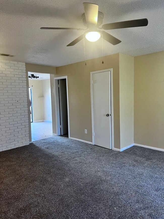 Building Photo - Introducing a 2-bedroom, 1.5-bathroom condo that offers the perfect blend of comfort and convenie...