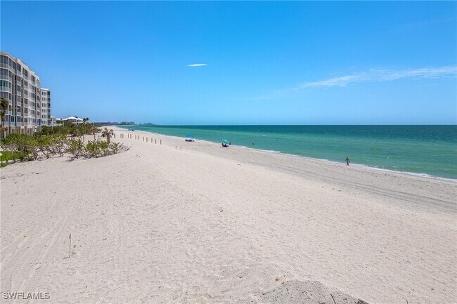 Building Photo - 265 Barefoot Beach Blvd