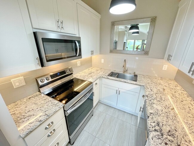 Building Photo - Experience Island Living in a Renovated 2-...