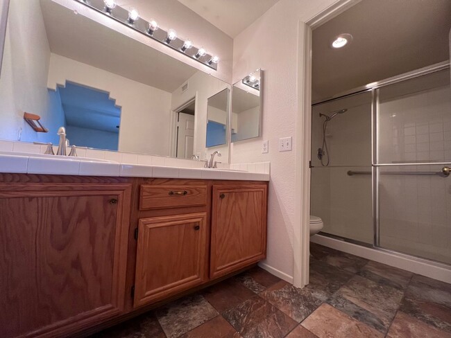 Building Photo - TWO BEDROOM CONDO WITH TWO CAR GARAGE IN H...