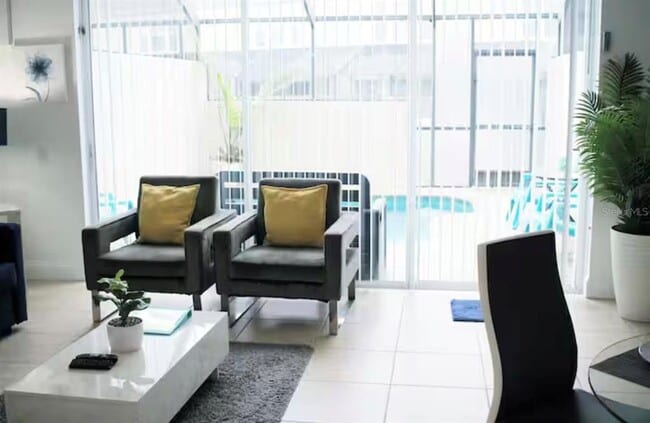 Building Photo - 8117 Princess Palm Ln