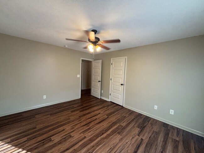 Building Photo - This property blends ample living space and storage with functional amenities.