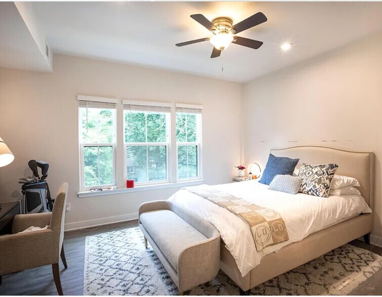 Gorgeous well lit bedroom with ensuite bathroom upgrade countertops. - 314 Music Hall Way