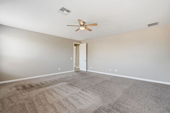Building Photo - Spacious 5-Bedroom Home with Open Floor Plan & Private Backyard
