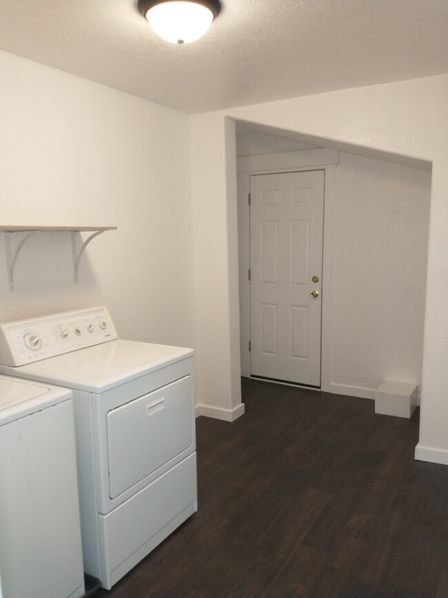 Laundry room and back entrance - 306 S. 2nd. St.