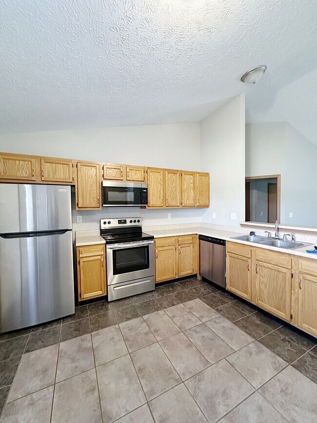 Building Photo - STUNNING Pond Views in this 2-Bed, 2-Bath Duplex