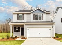 Building Photo - Modern 3BR Home with Granite Kitchen & 2-Car Garage – Minutes from Downtown in Meredith Woods!