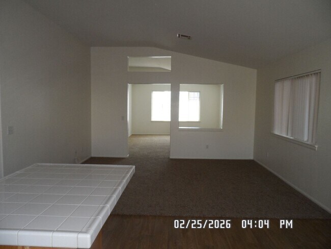 Building Photo - 3 Bedrooms, 2 Bathrooms, Approx 1582 sq. ft., 2 Car Garage, Fenced Back Yard, Rock-scaped Front Y...