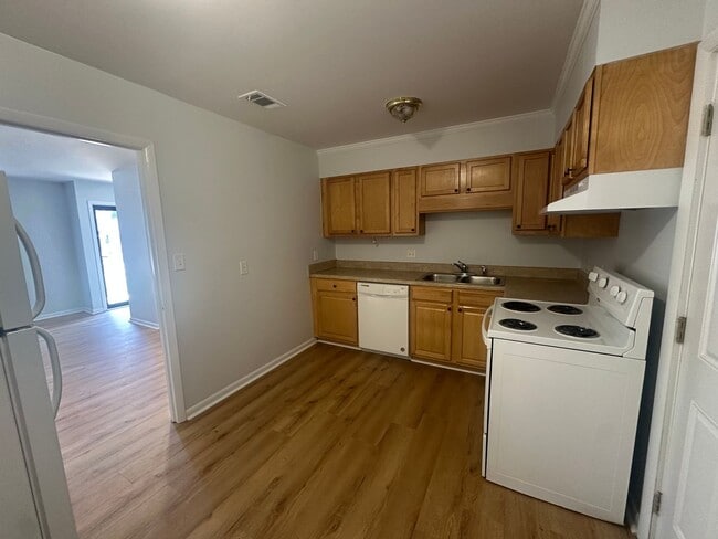 Building Photo - OPEN HOUSE 3/28 from 1PM to 3PM. Pet Friendly 2 Bedroom, 1 Bath Duplex Located in the Center of W...