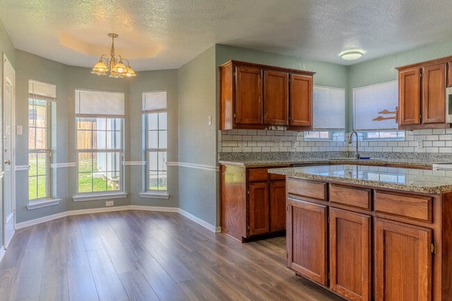 Building Photo - "Charming and Spacious 1,575 Sq Ft Home with 3-Bedroom Retreat with 2 Full Baths!"