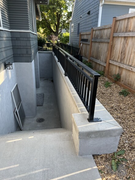 sunken patio and access to basement - 508 Daly Ave