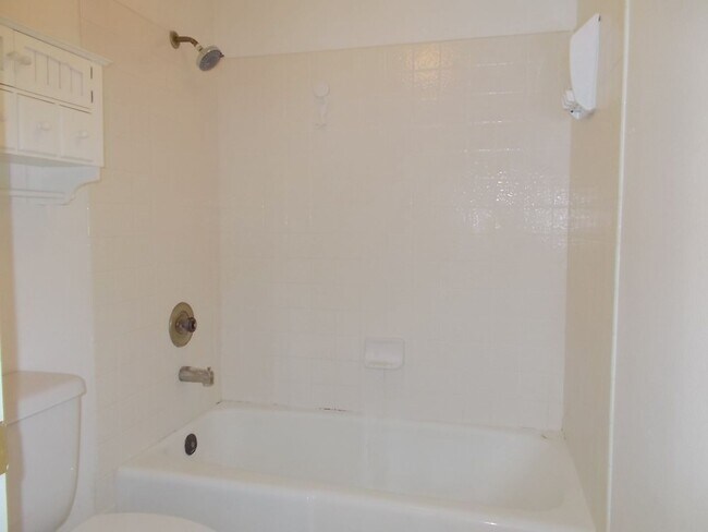 Building Photo - Two-story, 2-bedroom townhome ideally located in the heart of Boulder City