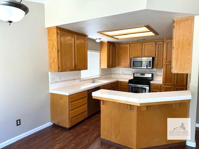 Building Photo - 7440 N Mansionette Dr