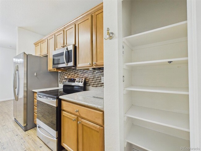 Building Photo - 10239 W 55th Dr