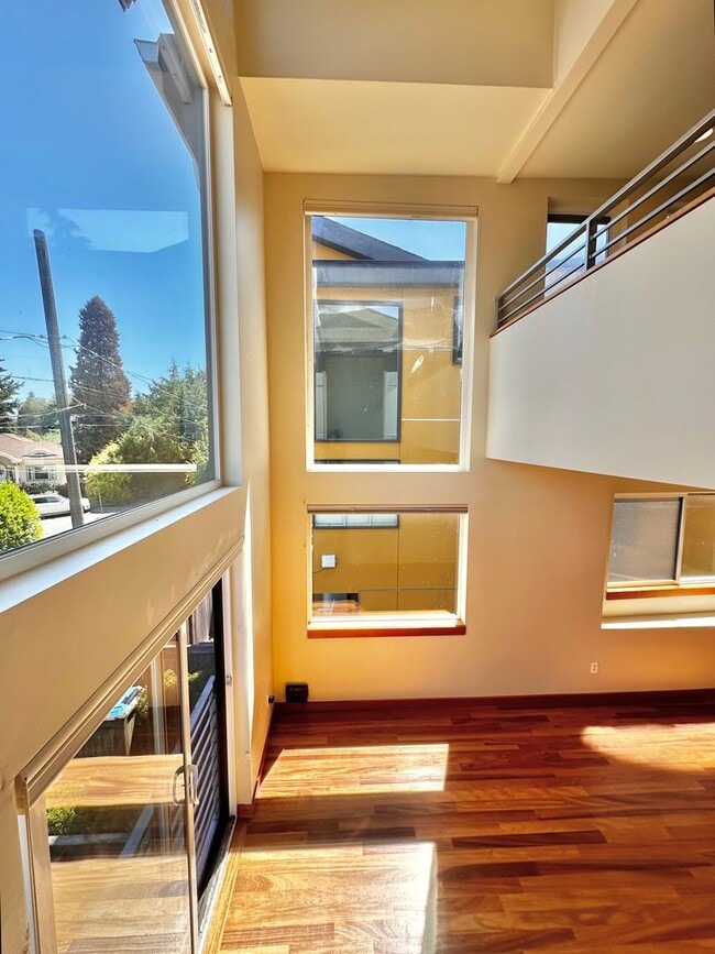Building Photo - Three-Level Loft-Style 2BR | 3BA with Priv...