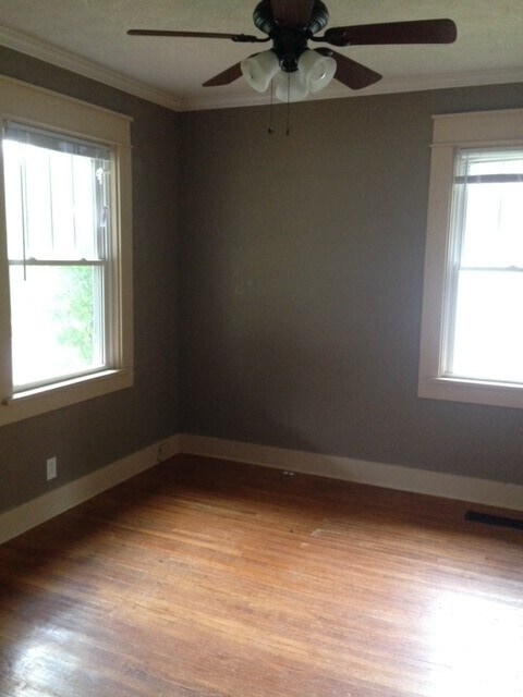 Bedroom, hardwood floors - 209 E Vermilya Ave