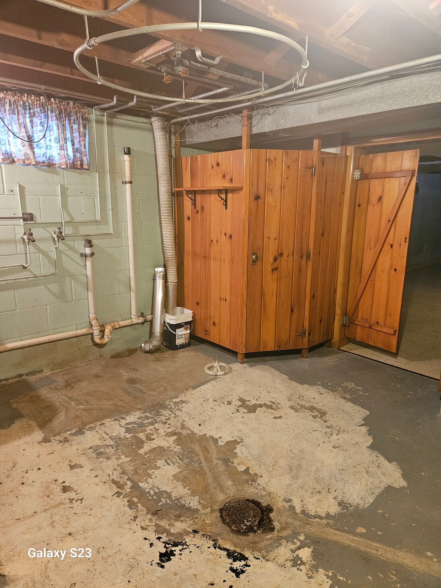 Vinyl is being laid in the laundry/bath area. - 1168 Reed St