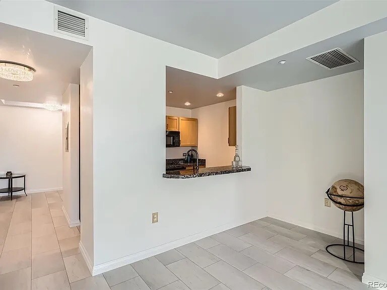 living area into kitchen - 300 W 11th Ave