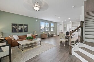 Inviting Living Room and Open Kitchen - Equinox West Townhomes