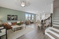 Inviting Living Room and Open Kitchen - Equinox West Townhomes